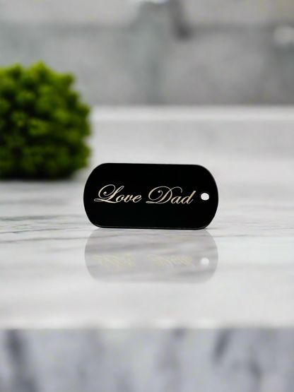 Black aluminum dog tag engraved with Love Dad in script — Webb's Engravings, Livonia MI