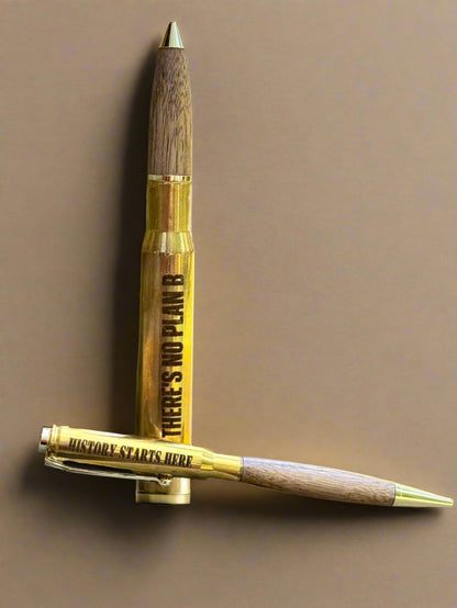 .50 cal and .30-06 brass casing pens with walnut barrels and engraved phrases — Webb's Engravings