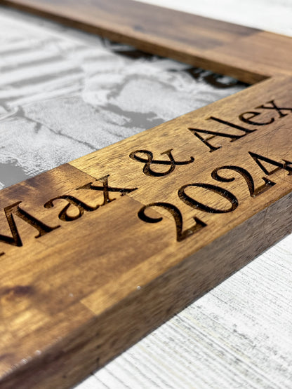 Detail of Max & Alex 2024 engraved into the wood frame edge