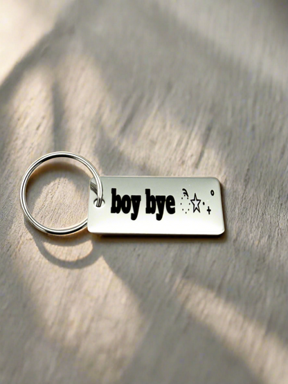 Rectangular aluminum keychain engraved with lettering