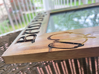 Wood frame with engraved lettering, close detail, gold color add on
