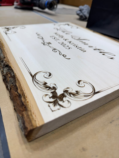 Live edge basswood plaque standing upright in the workshop
