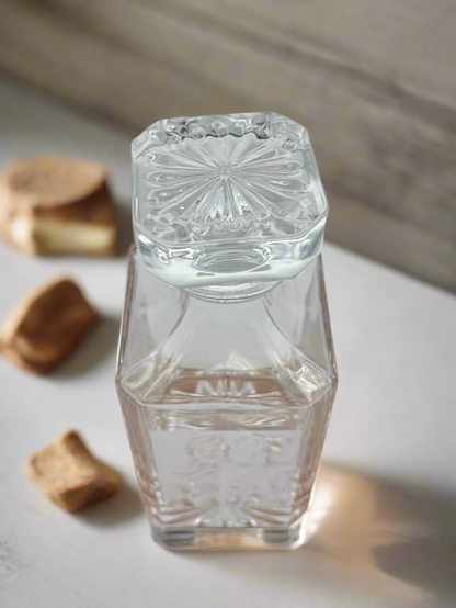 Square decanter with stopper removed showing the glass thickness