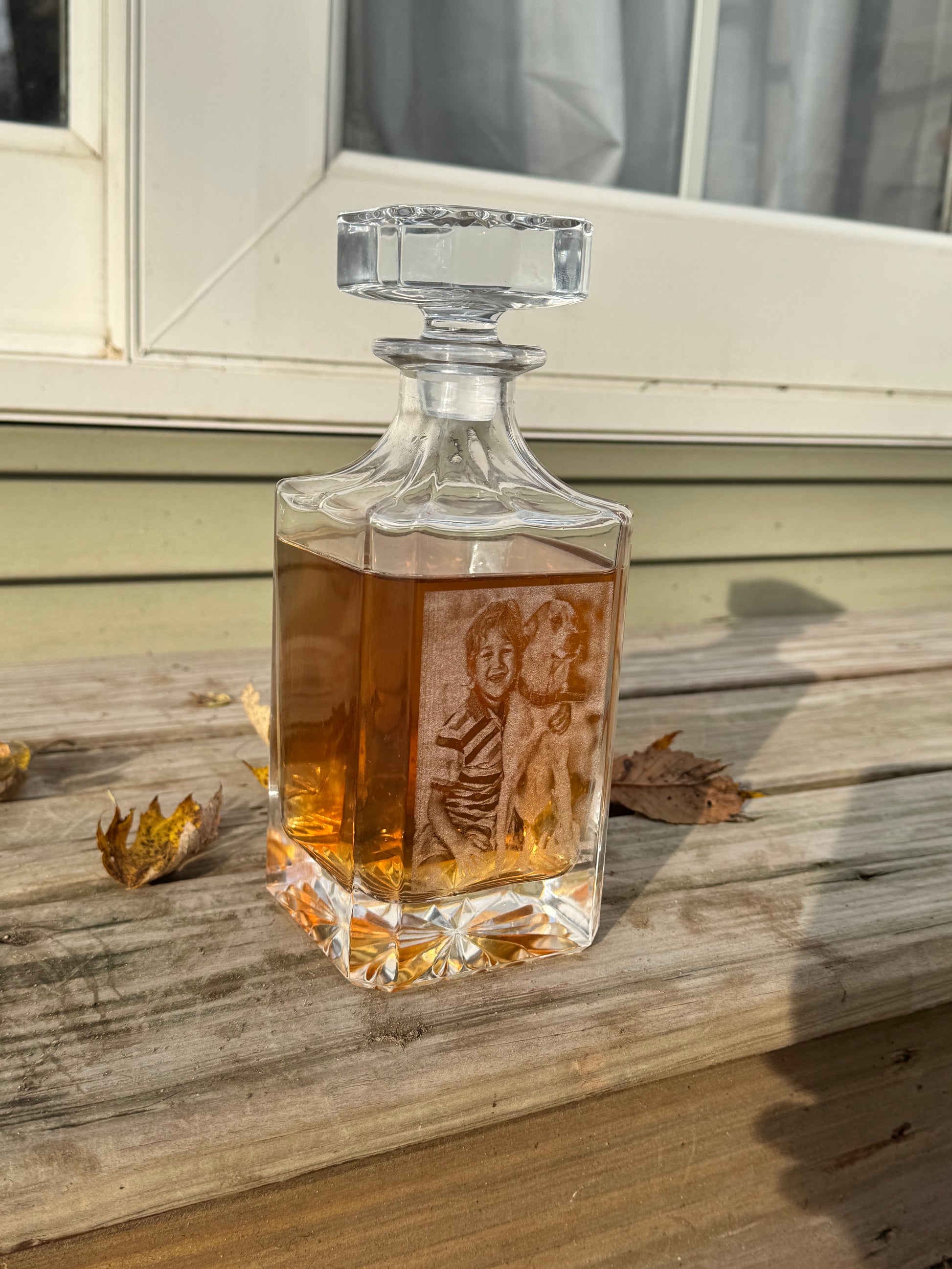 Photo engraved decanter on a porch step in natural light