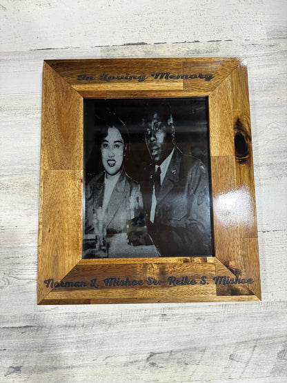 Portrait engraved on wood in a rustic frame, warm lighting