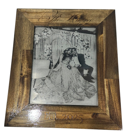 Wedding portrait laser engraved on wood in a wide walnut frame
