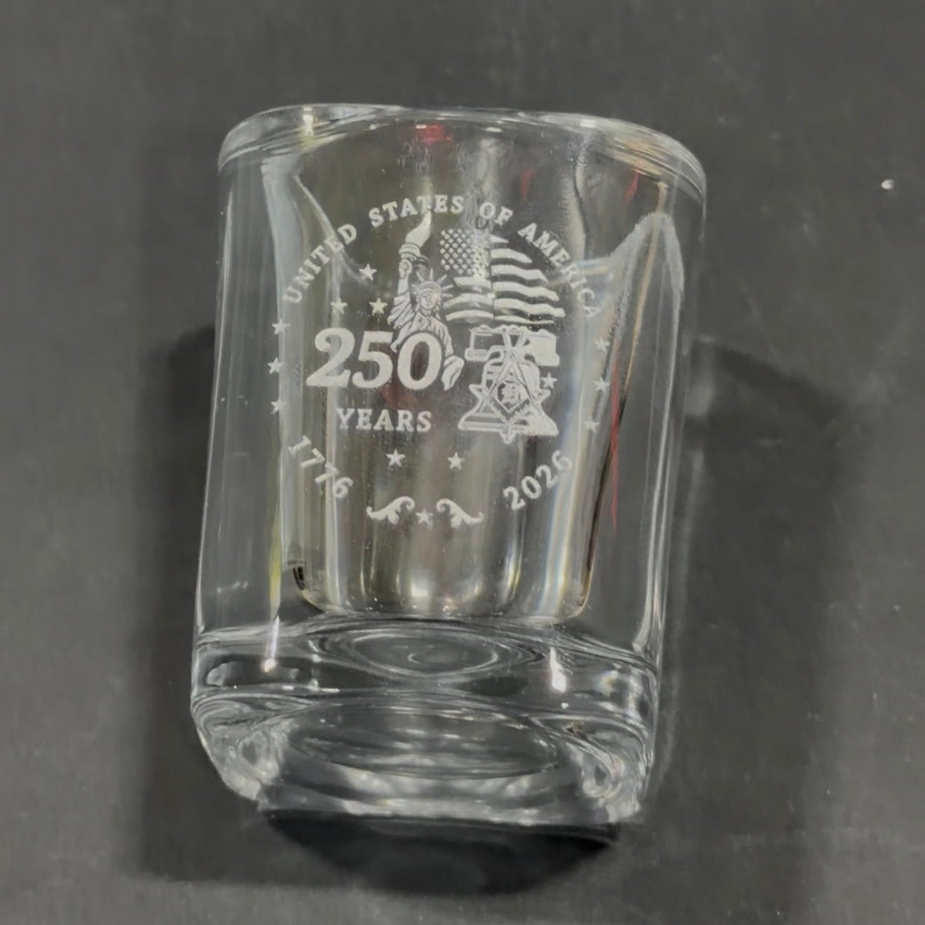 Square shot glass engraved with a 250 Years America design