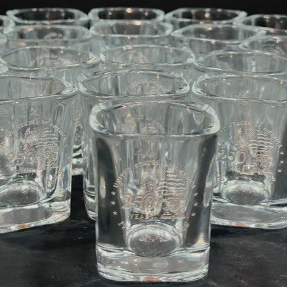 Group of engraved shot glasses with matching designs